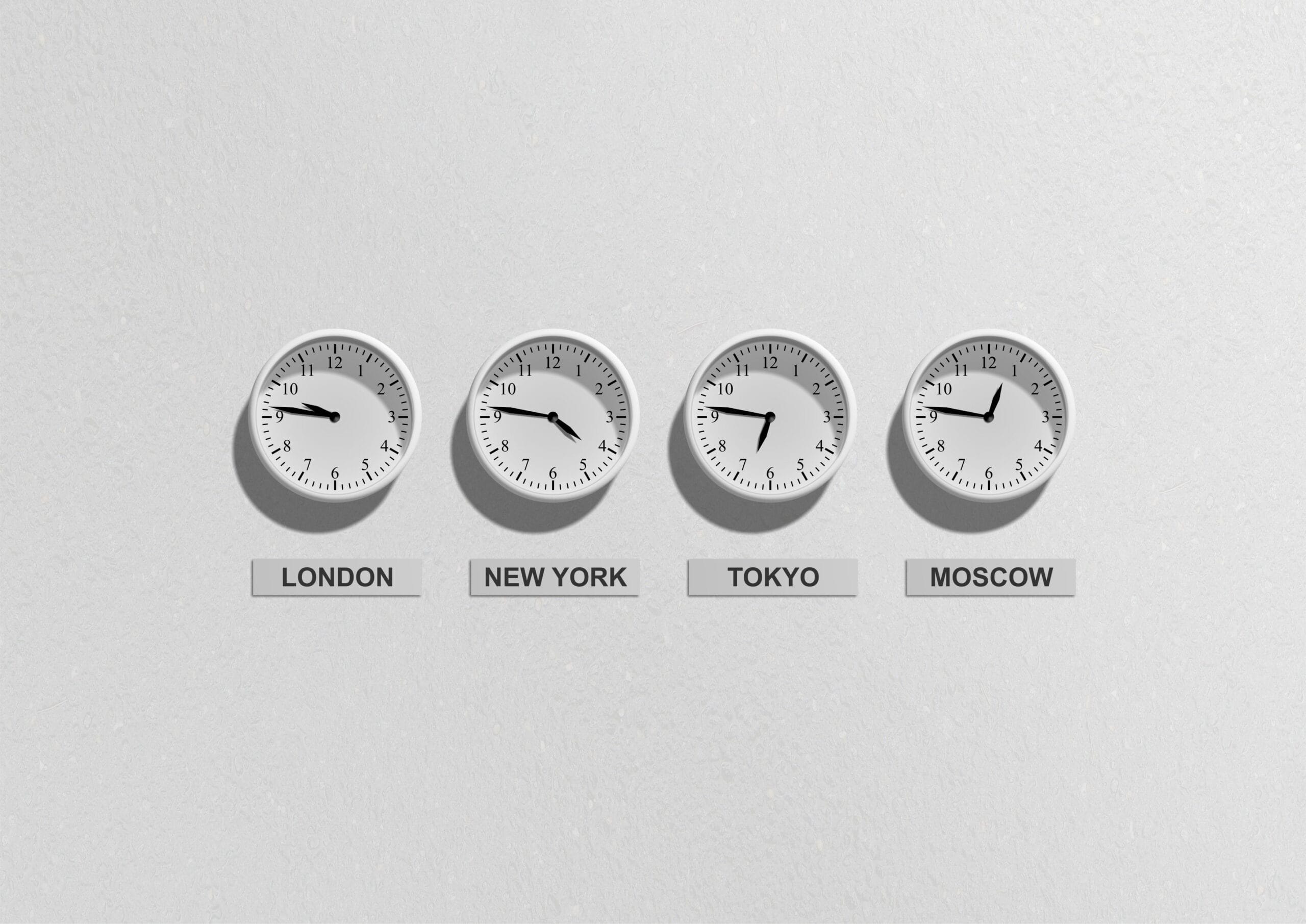 Medication Across Time Zones: A Practical Guide, Four wall clocks showing different time zones for London, New York, Tokyo, and Moscow.