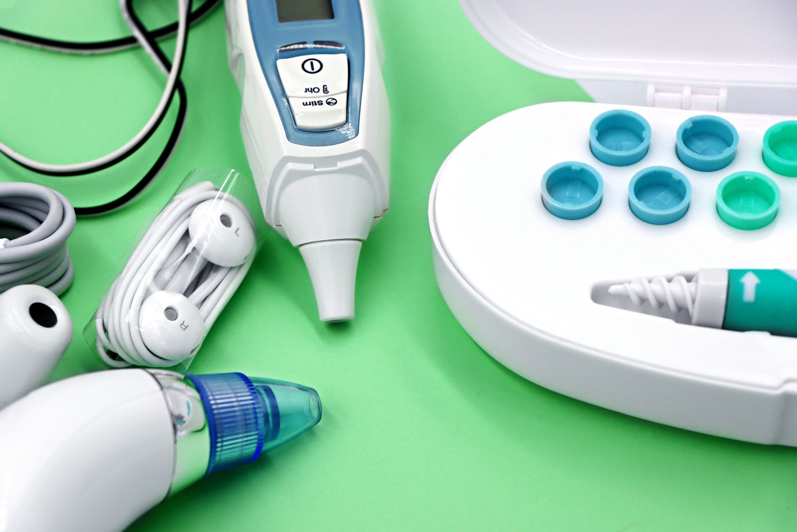 Travel Medical Kit Checklist for Health Conditions, A variety of ear care devices including ear buds, medical instruments, and cleaning tools.